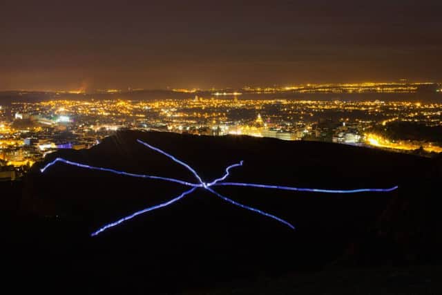 Runners and walkers  make their way up Arthur's Seat as part of a dress rehearsal of 'Speed of Light' Picture: Dan Kitwood/Getty Images