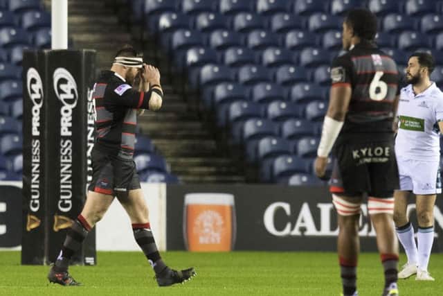 Edinburgh's Simon Berghan walks off after being shown a red card against Glasgow. Picture: Ross Parker/SNS