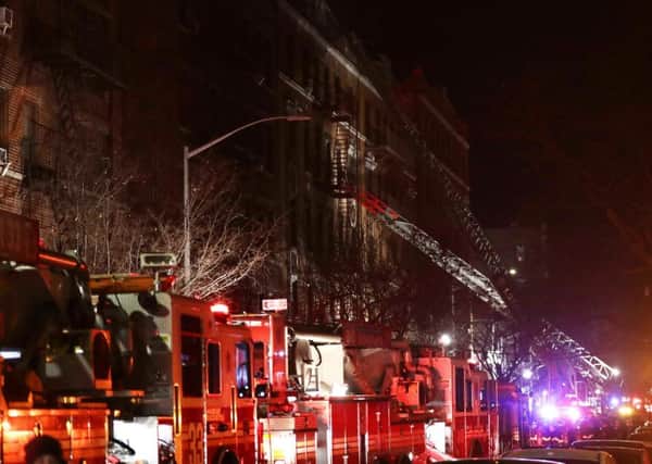 Firefighters responded to the deadly fire in the Bronx borough of New York. Picture: AP Photo/Frank Franklin II