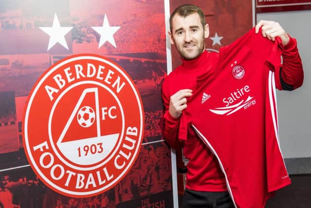Aberdeen's Niall McGinn is unveiled to the media. Picture: Gary Hutchison/SNS