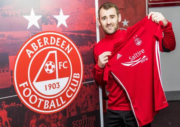Aberdeen's Niall McGinn is unveiled to the media. Picture: Gary Hutchison/SNS