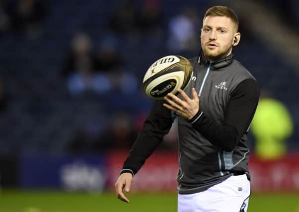 Glasgow Warriors' Finn Russell began the game on the bench against Edinburgh last week but has been picked to start for the second leg at Scotstoun. Picture: Ross Parker/SNS