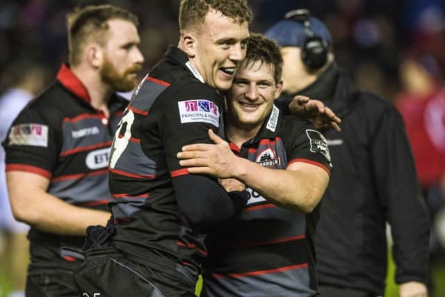 Edinburgh's Fraser McKenzie, left, and James Johnstone celebrate the win over Glasgow at Murrayfield. Picture: Gary Hutchison/SNS/SRU