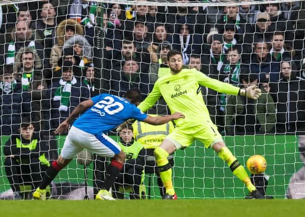 Celtic goalkeeper Craig Gordon makes a crucial stop to deny Rangers Alfredo Morelos. Picture: Alan Harvey/SNS