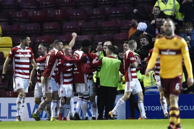 Hamilton players celebrate after Rakish Bingham scores to make it 2-1. Picture: SNS