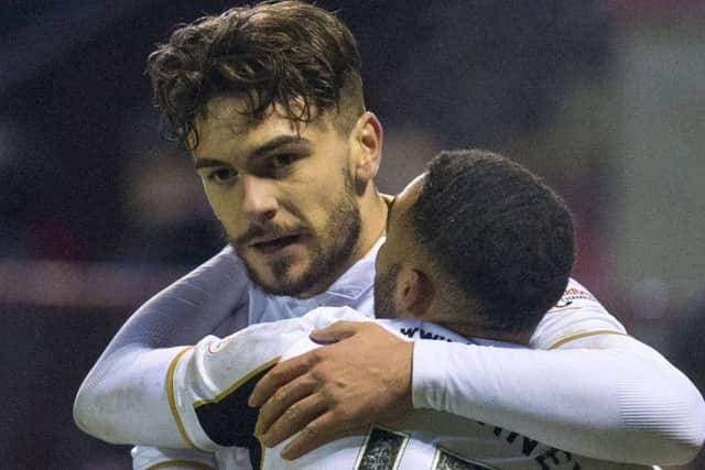George Oakley, left, celebrates his goal with Jake Mulraney. Picture: SNS