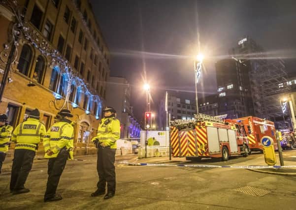 Emergency services at the scene of a fire at a 12-storey building in the Northern Quarter of Manchester. Picture: Danny Lawson/PA Wire