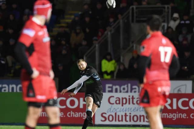 Glasgow stand-off Finn Russell kicks a penalty against Edinburgh. Picture: SNS/SRU