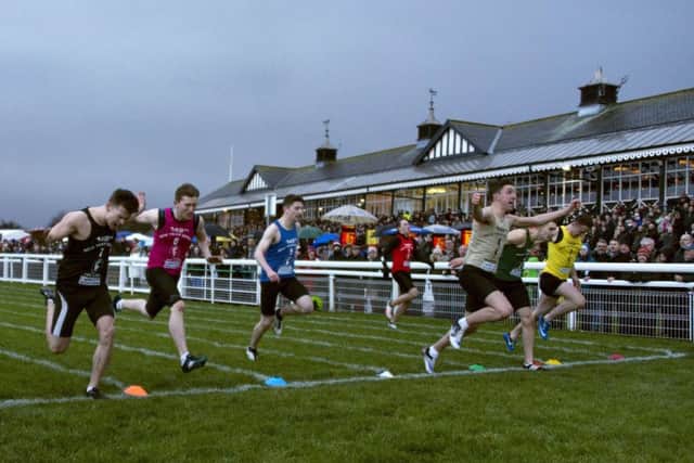 Calum McWilliam crosses the finishing line at Musselburgh Racecourse to win the New Year Sprint. Picture: Andrew O'Brien.
