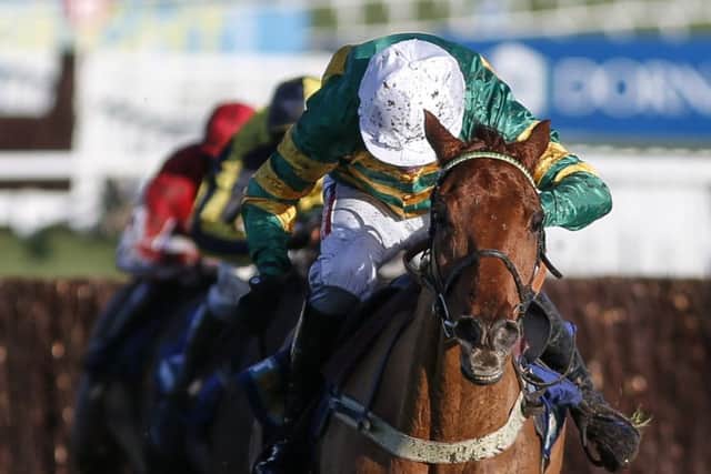 CHELTENHAM, ENGLAND - JANUARY 01: Barry Geraghty riding Yanworth clear the last to win The BetBright Dipper Novices Steeple Chase at Cheltenham Racecourse on January 1, 2018 in Cheltenham, England. (Photo by Alan Crowhurst/Getty Images)