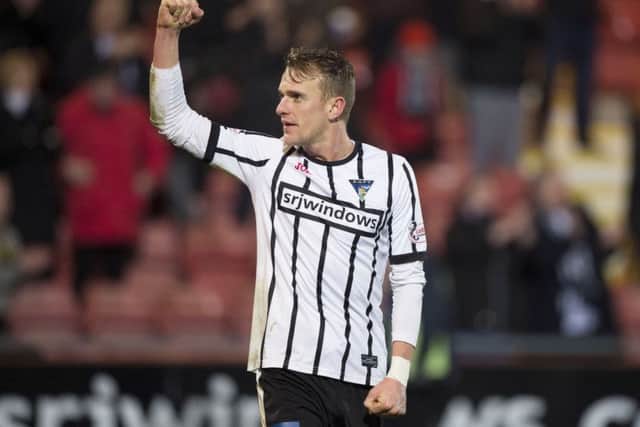 Dunfermline's Dean Shiels celebrates at full-time. He was subjected to abuse from some Falkirk fans during the match. Picture: Bill Murray/SNS