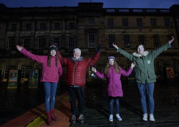 Scottish Crime Writer Val McDermid (second left) with Maisie Dalton (left), 12, Lucy Hutcheon, 11 and Jemma Glover (right), 16, outside the Signet Library in Edinburgh's Parliament Square. Picture: PA