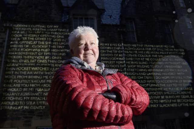 Scottish Crime Writer Val McDermid in front of words and images form her book New Year Resurrection, which is being projected onto the walls of the Writers Museum in Edinburgh. Picture: PA