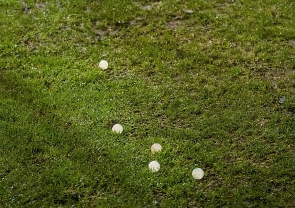 Rubber eyeballs lie scattered on the East End Park pitch during Tuesday's Dunfermline v Falkirk match. Picture: Bill Murray/SNS