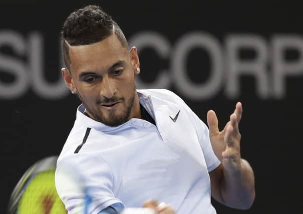 Nick Kyrgios in action against Matthew Ebden of Australia during the Brisbane International. Picture: Tertius Pickard/AP