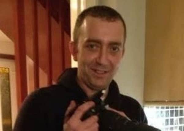 Colin Oliphant was found dead at a house in Kelty, Fife, after a hammer attack