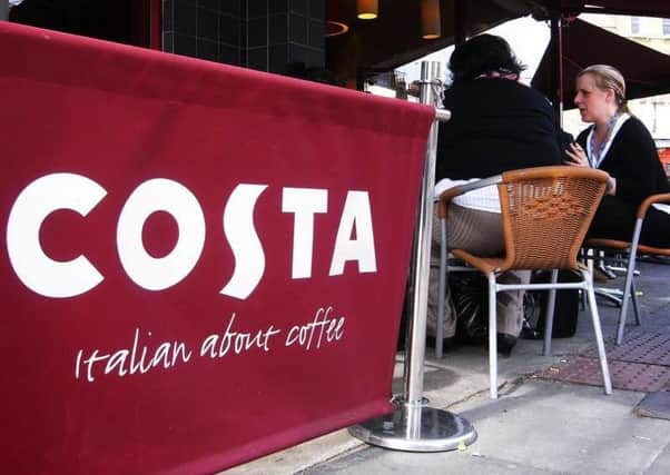 Some coffee chains, including Costa, have introduced discounts for customers who bring their own cups to be filled. Picture: PA