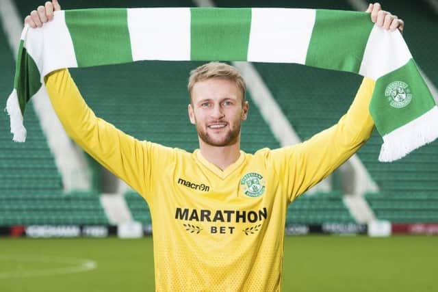 Scott Bain was paraded at Easter Road yesterday after moving to Hibs from Dundee on loan until the end of the season. Picture: SNS.