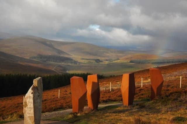 The Watchers on the A939 at Corgarff,  a group of cowled seats with views over Glen Avon and Deeside, are one of three installations on the Snow Roads. PIC: Cairngorms National Park Authority.
