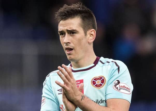 Jamie Walker is moving to League One leaders Wigan Athletic in a Â£300,00 deal.