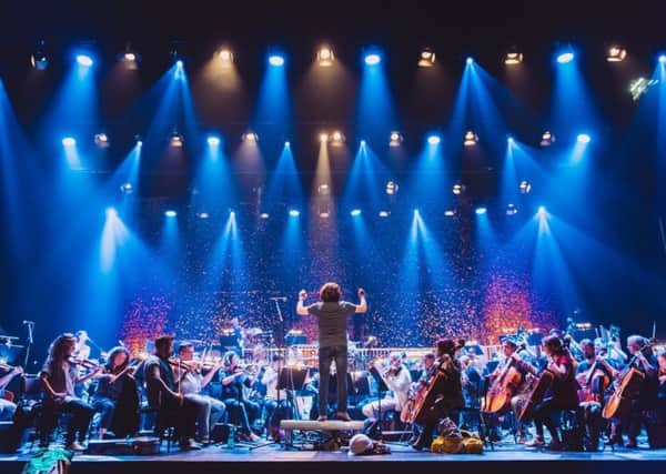 The Grit Orchestra, conducted by Greg Lawson