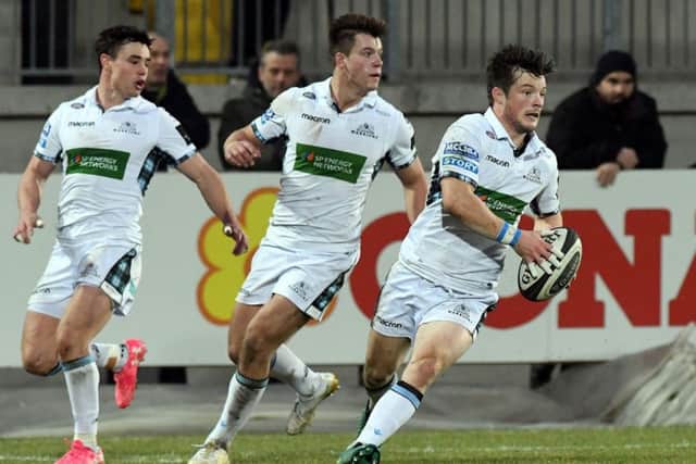 Warriors George Horne has support as he turns, ball in hand, ready to begin another Glasgow attack. Picture: Federico Matteucci/INPHO/REX/Shutterstock