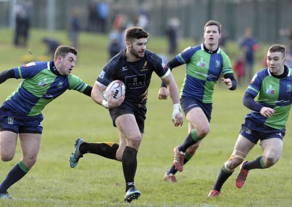 Robbie Nelson of Currie on the run against Boroughmuir. Picture:

 Neil Hanna