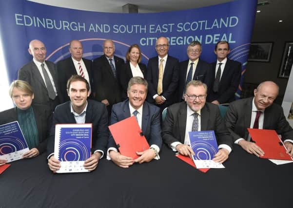 Ministers and councillors sign the Edinburgh and South East Scotland in July 2017. Picture: Greg Macvean
