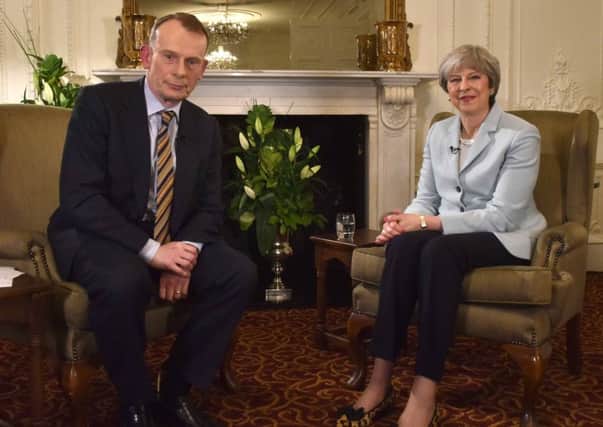 Theresa May was interviewed in her constituency by Andrew Marr for the BBC on Sunday. Picture: BBC handout/PA
