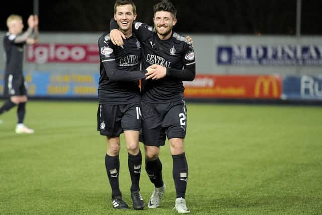 Falkirk's Louis Longridge, left, and Lewis Kidd, who scored three goals between them, celebrate at the final whistle. Picture: Michael Gillen.