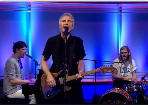 Franz Ferdinand perform on the Andrew Marr Show, with drummer Paul Thomson showing support for the NHS (right). Picture: BBC