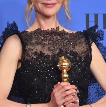 Actress Nicole Kidman poses with the trophy for Best Performance by an Actress in a Limited Series or a Motion Picture Made for Television  / AFP PHOTO / Frederic J. BROWNFREDERIC J. BROWN/AFP/Getty Images