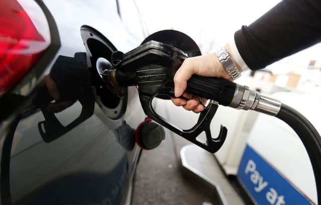 Diesel fuel is pumped into a car as the oil price hits a three-year high. Picture: Lynne Cameron/PA Wire