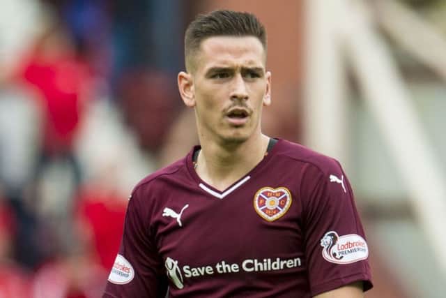 Jamie Walker has completed his move from Hearts to Wigan. Picture: SNS