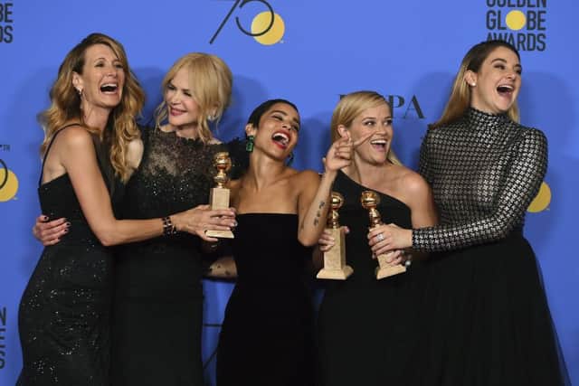 Laura Dern, from left, Nicole Kidman, Zoe Kravitz, Reese Witherspoon and Shailene Woodley pose in the press room with the award for best television limited series or motion picture made for television for "Big Little Lies" at the 75th annual Golden Globe Awards at the Beverly Hilton Hotel on Sunday, Jan. 7, 2018, in Beverly Hills, Calif. (Photo by Jordan Strauss/Invision/AP)