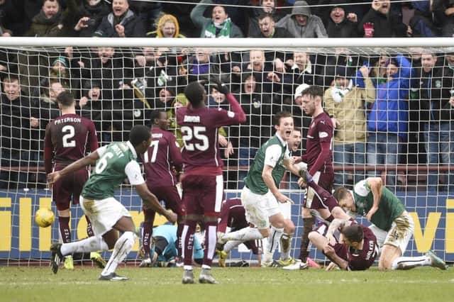Paul Hanlon, right, equalises for Hibs in the Scottish Cup clash at Tynecastle two years ago. Picture: Greg Macvean