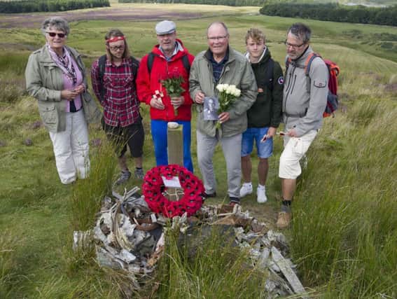 Klaus Forster, 80 (third from the right) and four generations of his family from Germany attended the memorial site at Hare Hill, Pentlands where his father, a Luftwaffe bomber pilot, died when his aircraft crashed in August 1943