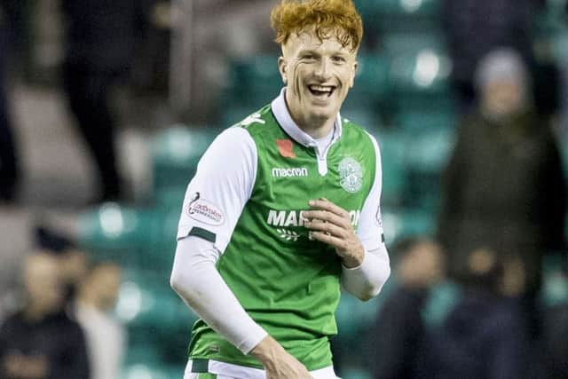 Simon Murray, who is staying at Hibs after the club rejected a bid for the striker.