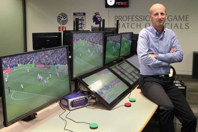 Referee Mike Riley in the VAR hub in London: Picture: PA
