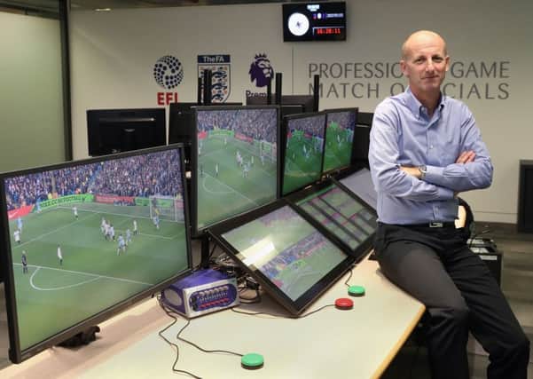 Referee Mike Riley in the VAR hub in London: Picture: PA