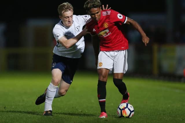 Demetri Mitchell in action for Manchester United's under-23 side against Tottenham during the Premier League 2 match last August. Picture: Alex Morton/Getty Images