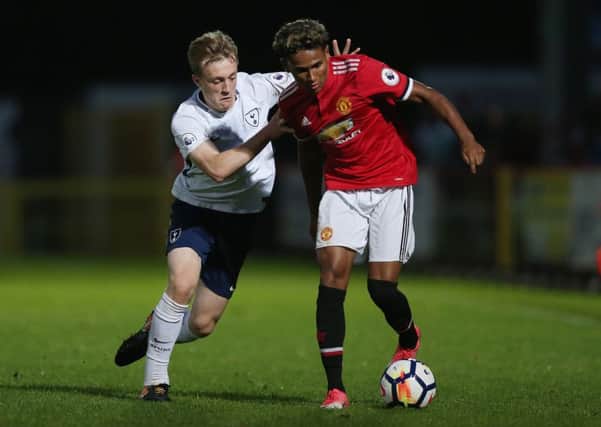 Demetri Mitchell in action for Manchester United's under-23 side against Tottenham during the Premier League 2 match last August.  Picture: Alex Morton/Getty Images