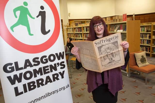 Donna Moore at the Glasgow Womens Library with a copy of the Suffragette from 1913.  Picture: Robert Perry