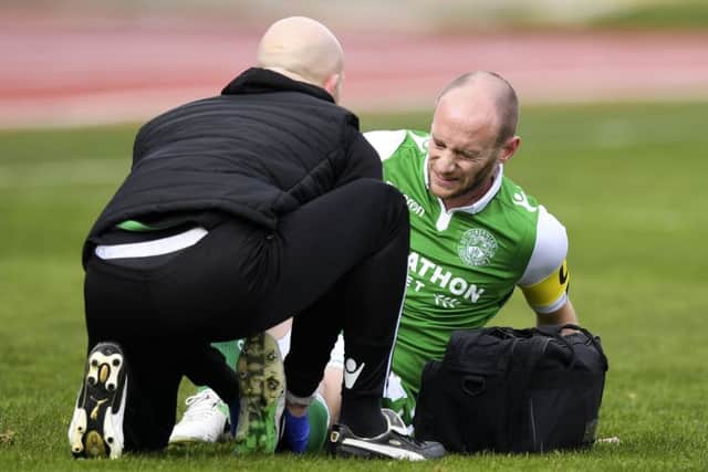 David Gray suffered an ankle injury early in the match