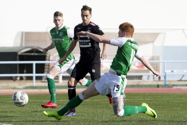 Simon Murray fires Hibs into the lead against Dutch side Willem II yesterday, but they went on to lose the friendly match 3-1. Picture: SNS.
