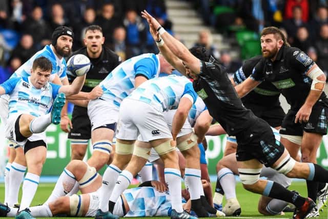 Leinsters Luke McGrath clears as Warriors Tim Swinson goes to block at Scotstoun in November. Photograph: Gary Hutchison/SNS Group/SRU