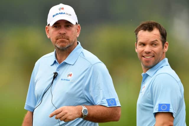 Paul Casey, right, has marked his return to the European fold by winning both his matches so far for captain Thomas Bjorn in Malaysia. Picture: Getty Images
