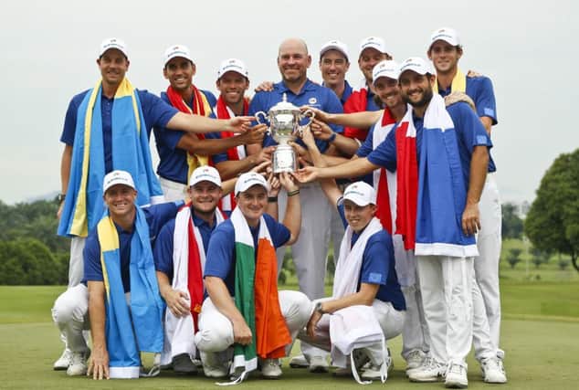 Captain Thomas Bjorn, centre, and his players celebrate Europe's victory in the EurAsia Cup in Kuala Lumpur. Picture: AP