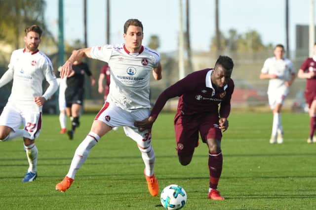 Striker Esmael Goncalves chases down the ball during Hearts 5-0 friendly defeat by  FC Nurnberg. Picture: SNS.