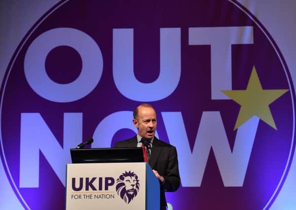 The leader of the UK Independence Party (UKIP) faced calls to resign after his girlfriend reportedly made racist remarks about Prince Harry's fiancee Meghan Markle. Picture: BEN STANSALL/AFP/Getty